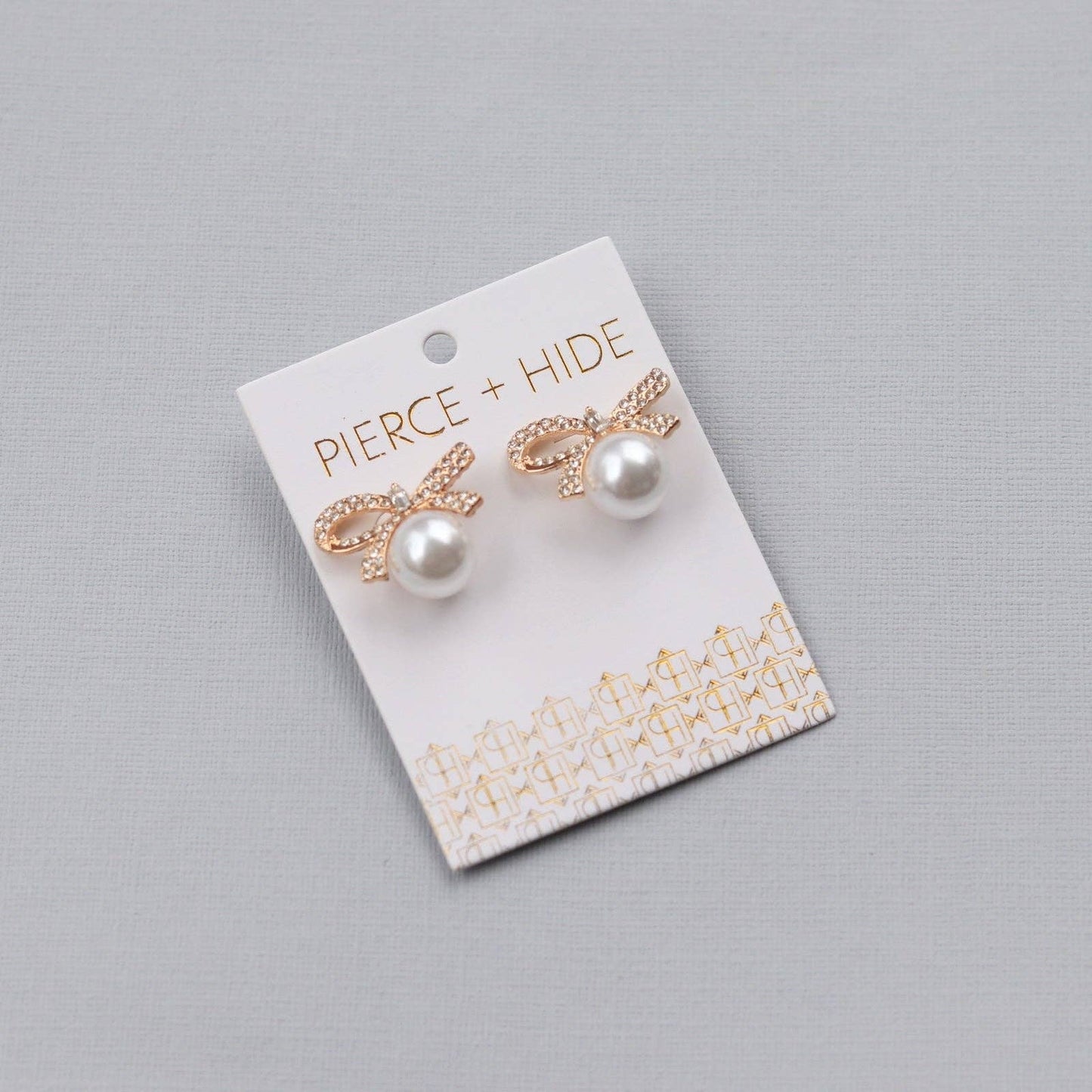 Pearl Bow Statement Studs