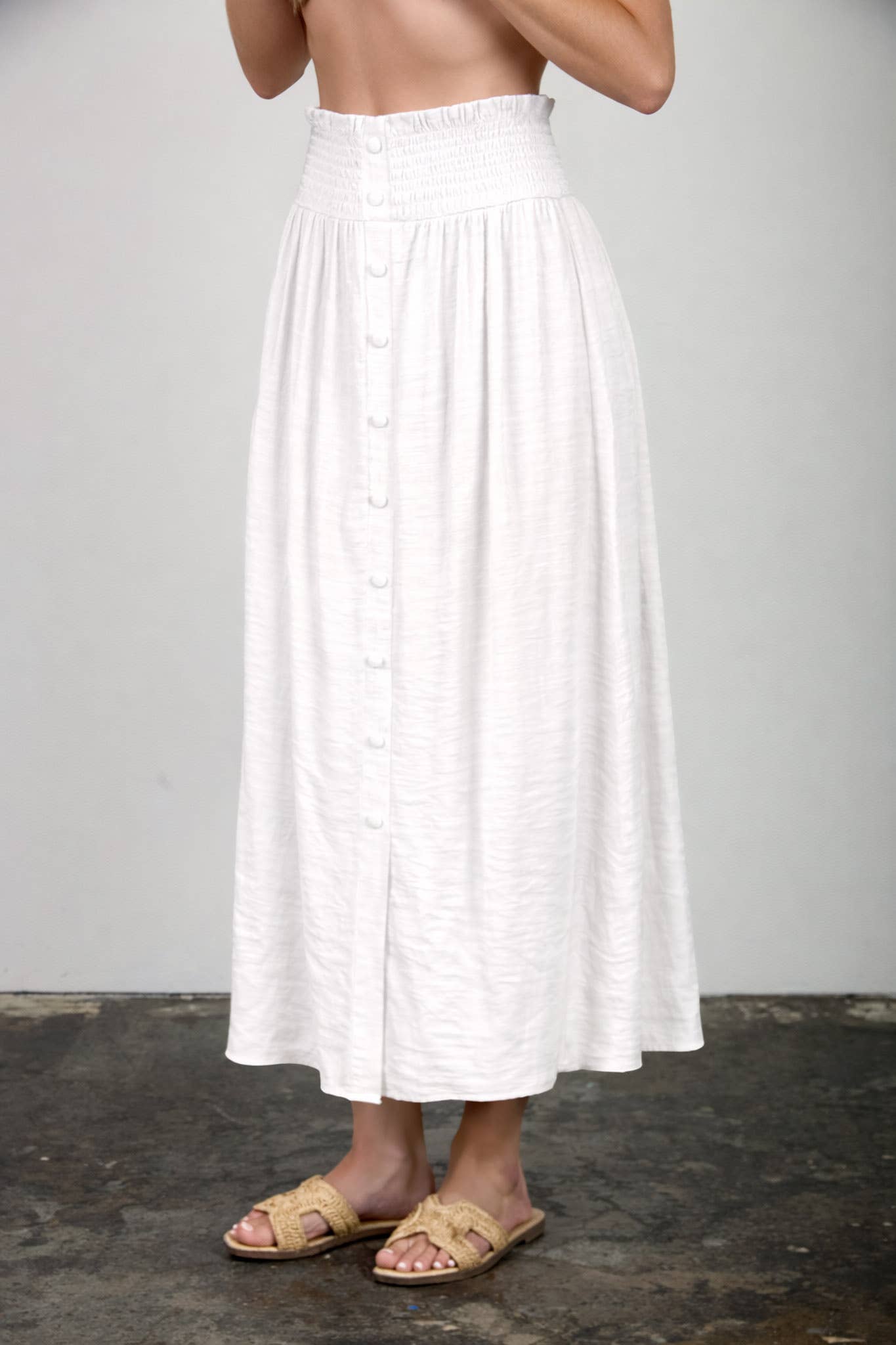 SMOCKED WAIST RUFFLE DETAIL BUTTON DOWN MIDI SKIRT: NATURAL