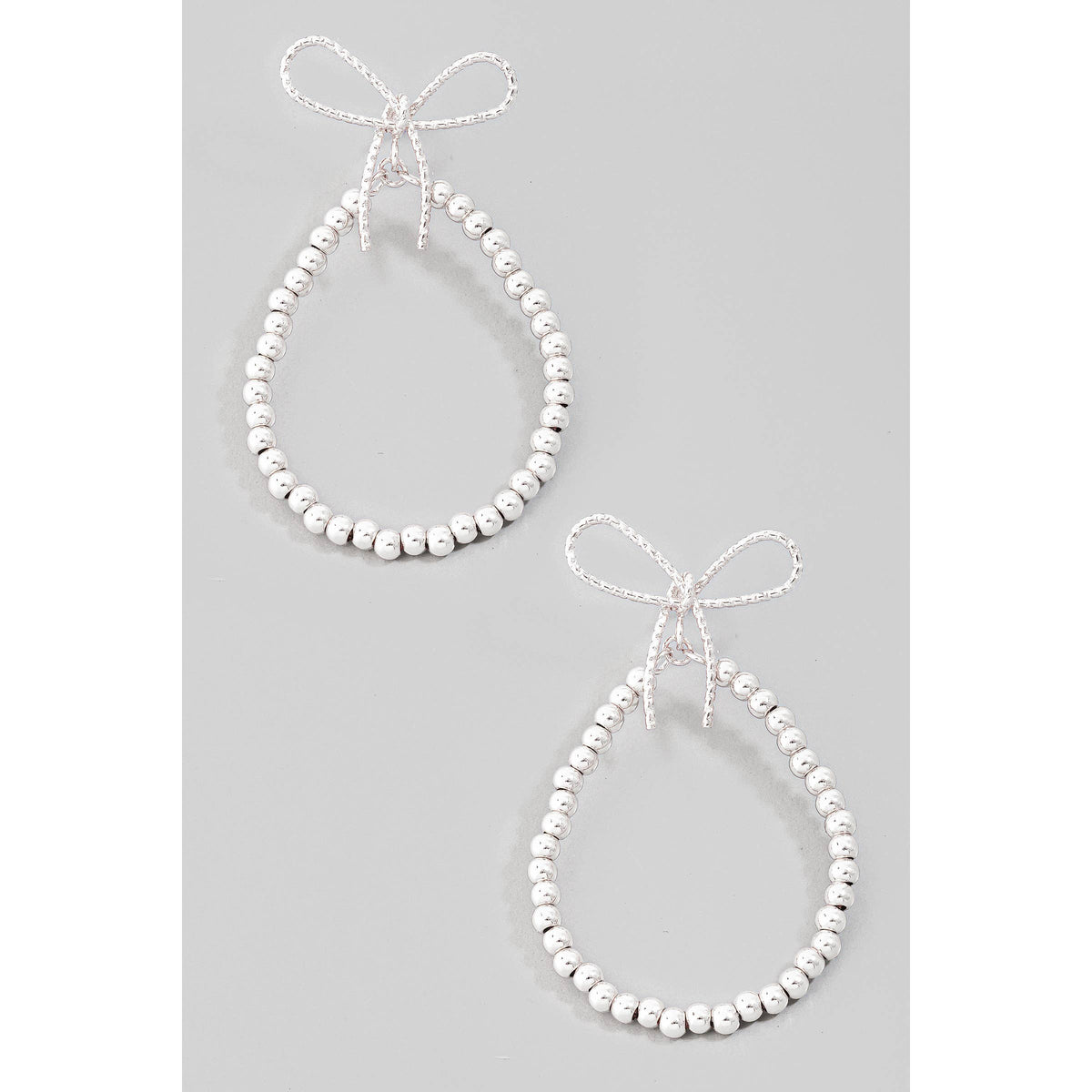 Metallic Beaded Tear Ribbon Bow Stud Earrings: Silver