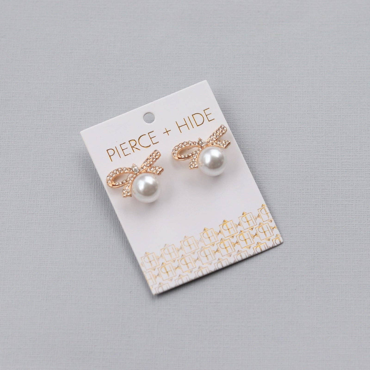 Pearl Bow Statement Studs