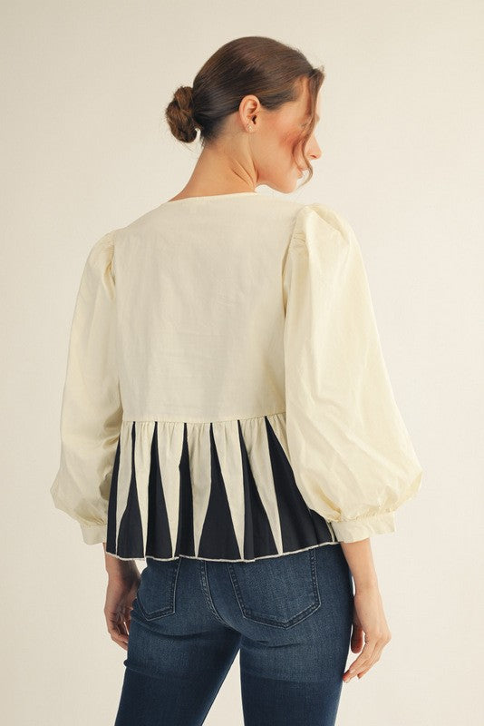 Midnight Bow Peplum Top