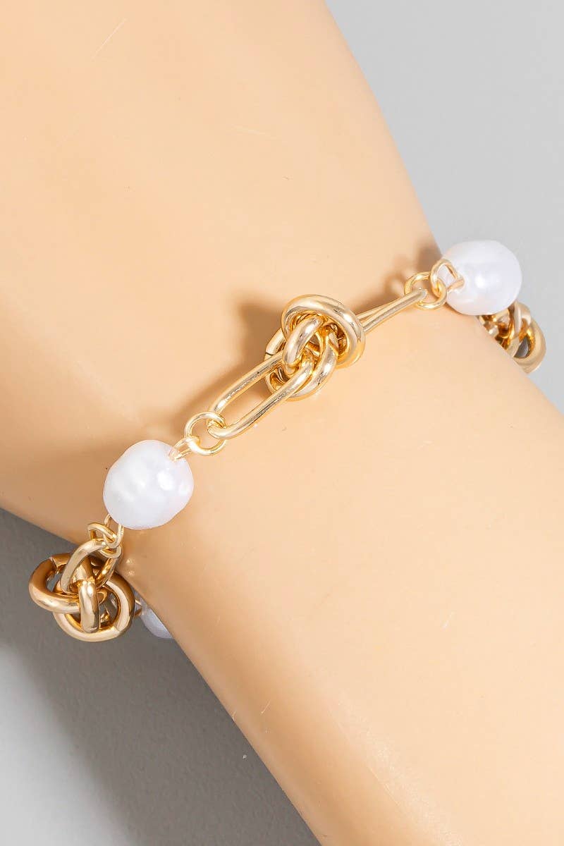 Pearl Beads And Oval Chain Bracelet: CRMSIL