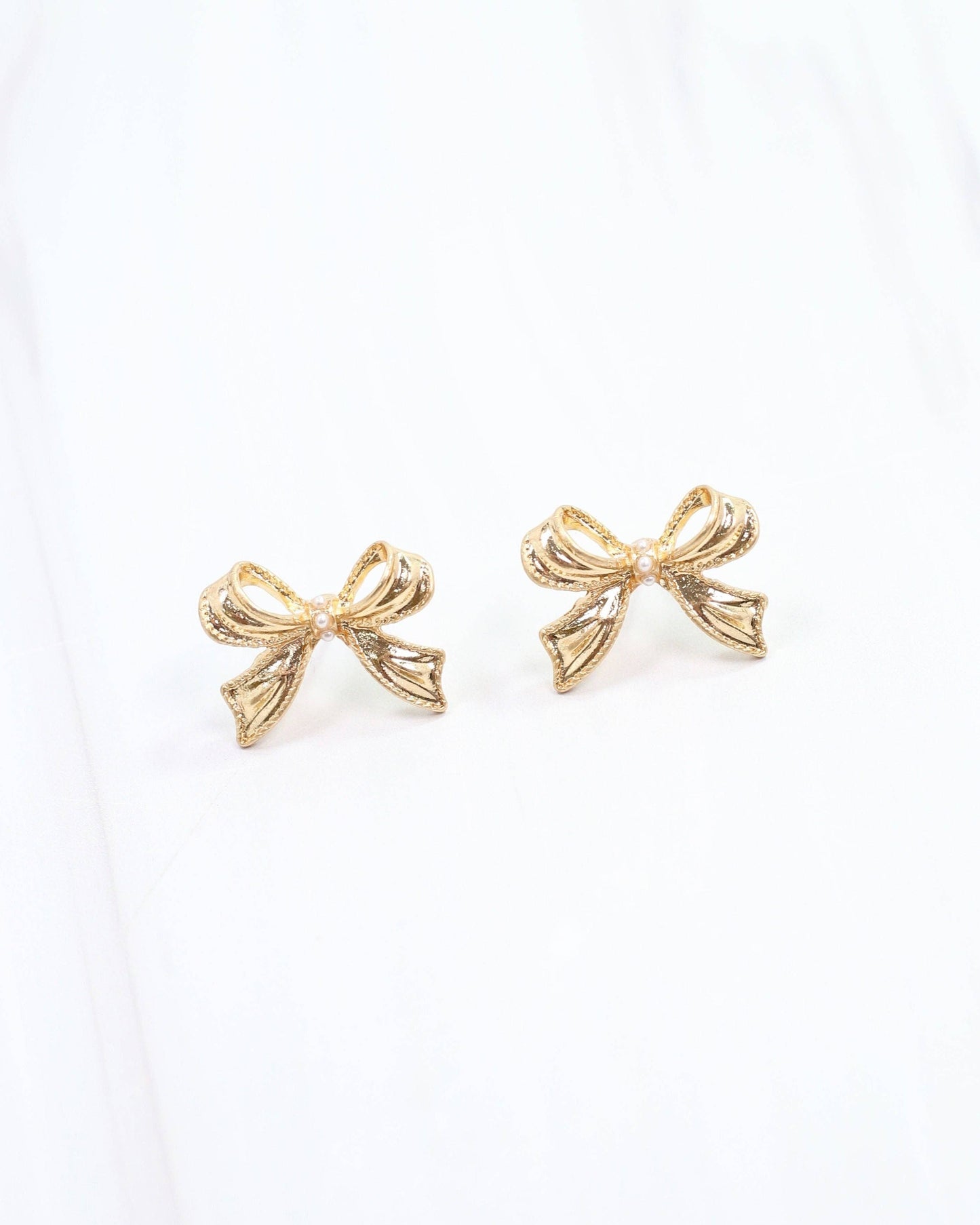 Emmie Bow Stud Worn Gold