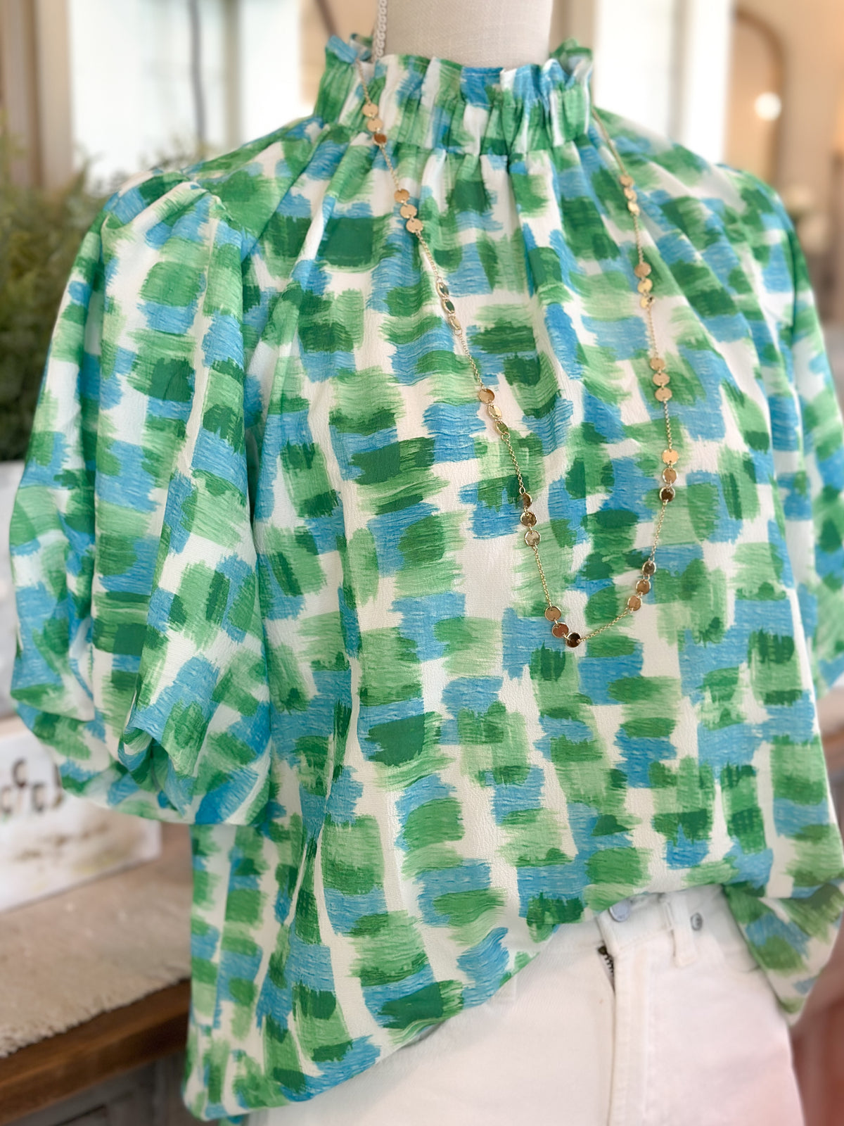 Green Abstract Button Back Ruffed High Neck Blouse