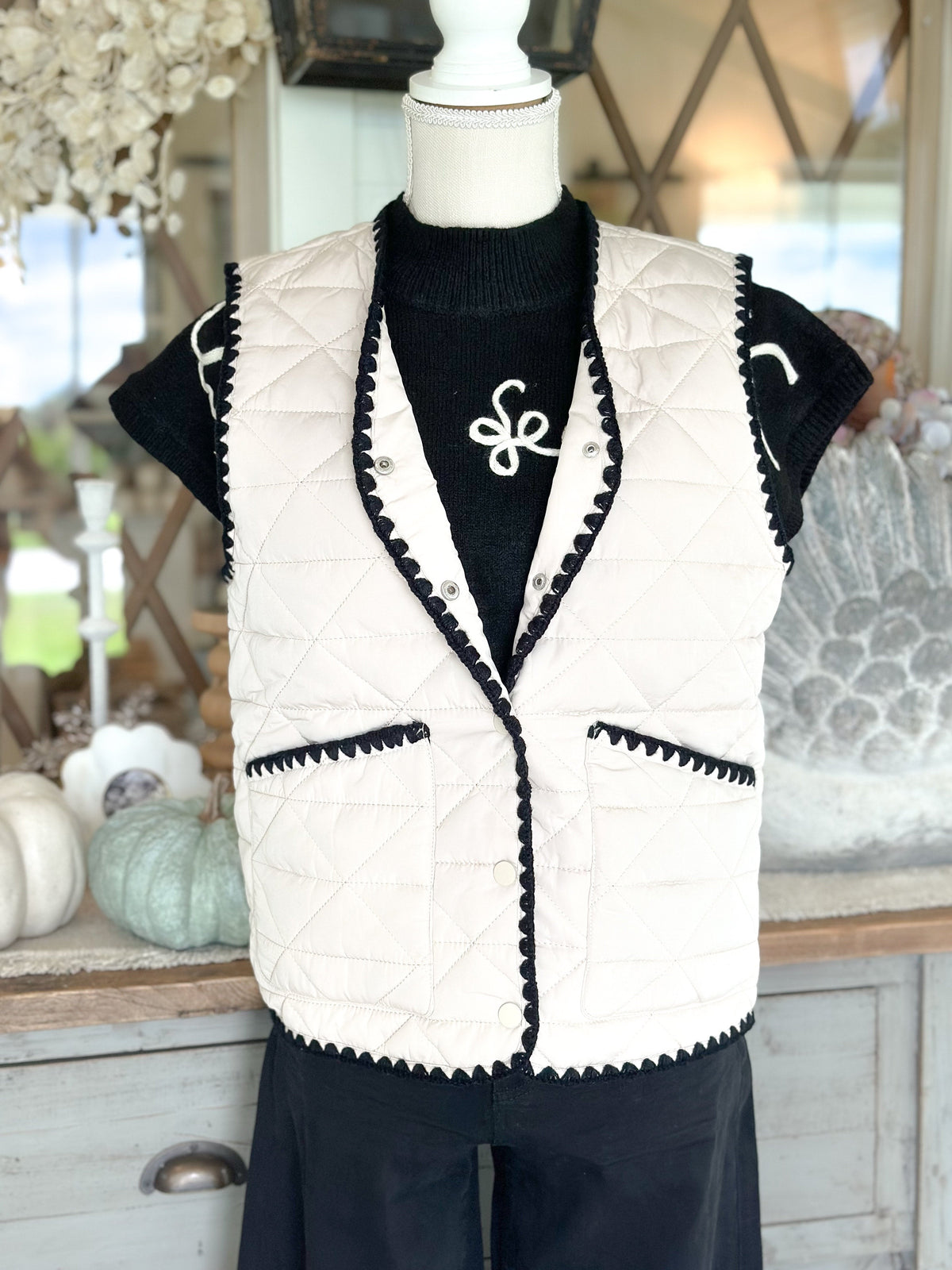 Quilted Cream Vest With Black Trim