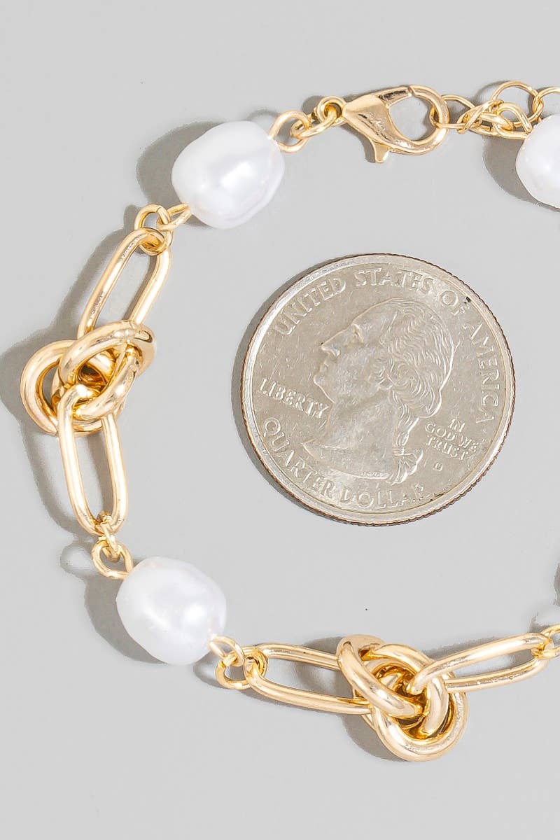 Pearl Beads And Oval Chain Bracelet: CRMSIL