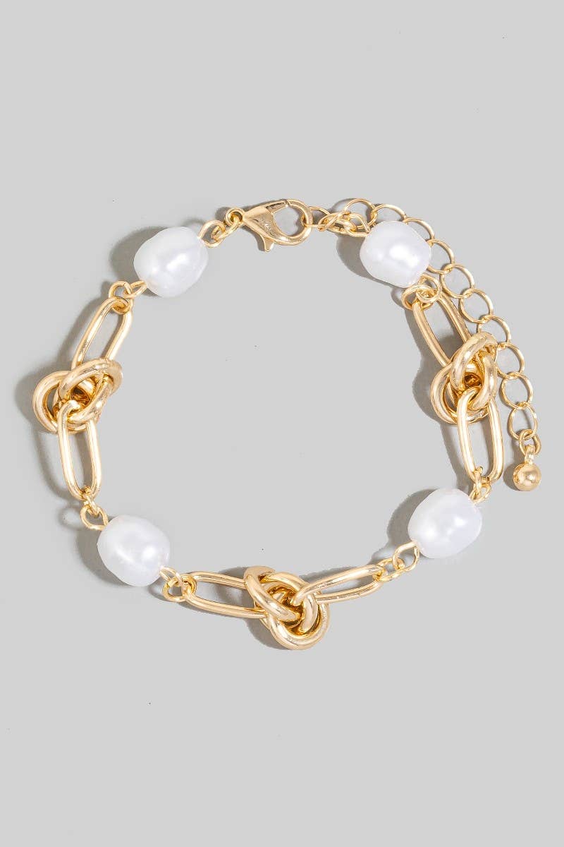 Pearl Beads And Oval Chain Bracelet: CRMSIL