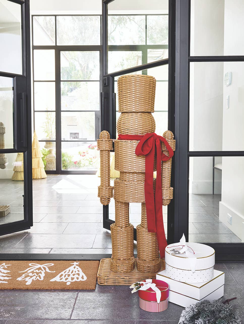 All Weather Rattan Nutcracker - Red: Rattan (Synthetic), Metal, Velvet Bow, 48" H x17.5" W x 12" D