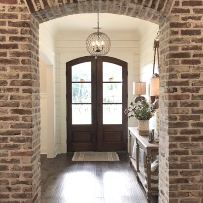 Interior brick arch and fireplace